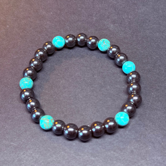 HÄMATIT Kugelarmband Howlith blau