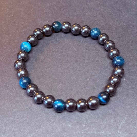 HÄMATIT Kugelarmband Tigerauge blau